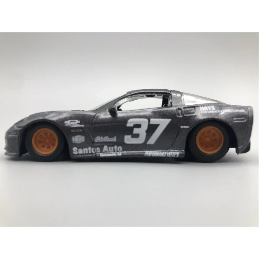 Jada 2006 06 Chevrolet Chevy Corvette Z06 Race Car Gray Diecast 1/64 Rubber Tire